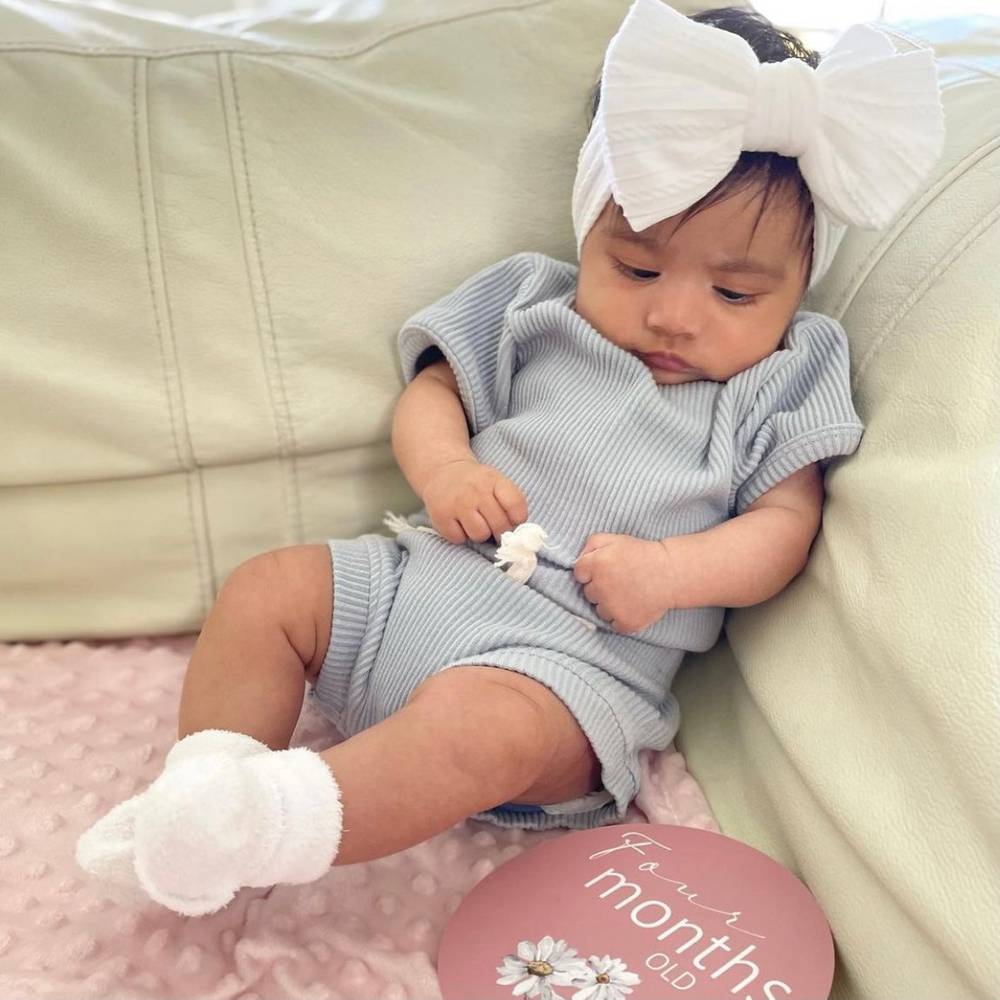Bowie Double Bow Baby Headband in White — white baby headband product styling