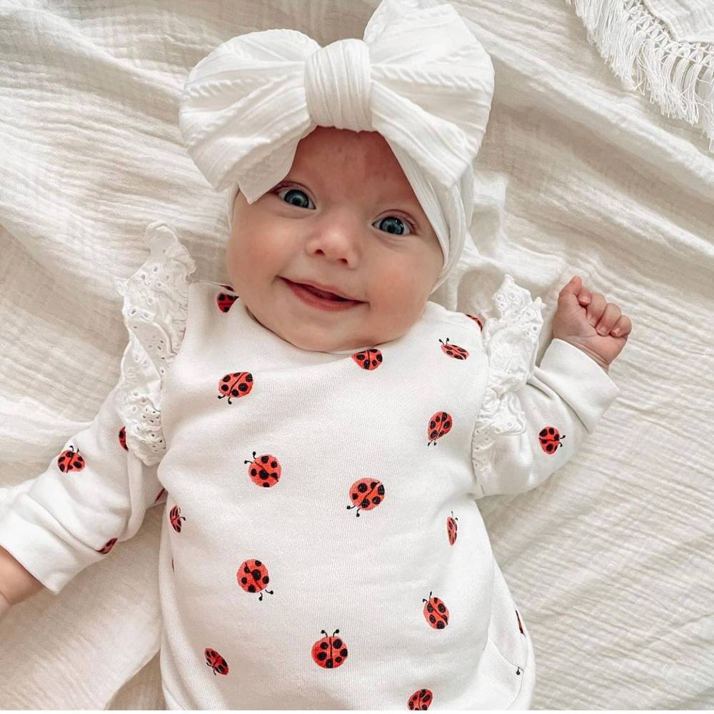 Bowie Double Bow Baby Headband in White — white baby headband colour swatch detail