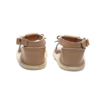 Baby feet in baby sandals on soft surface — Pale Pecan Leather Baby Bow Sandal