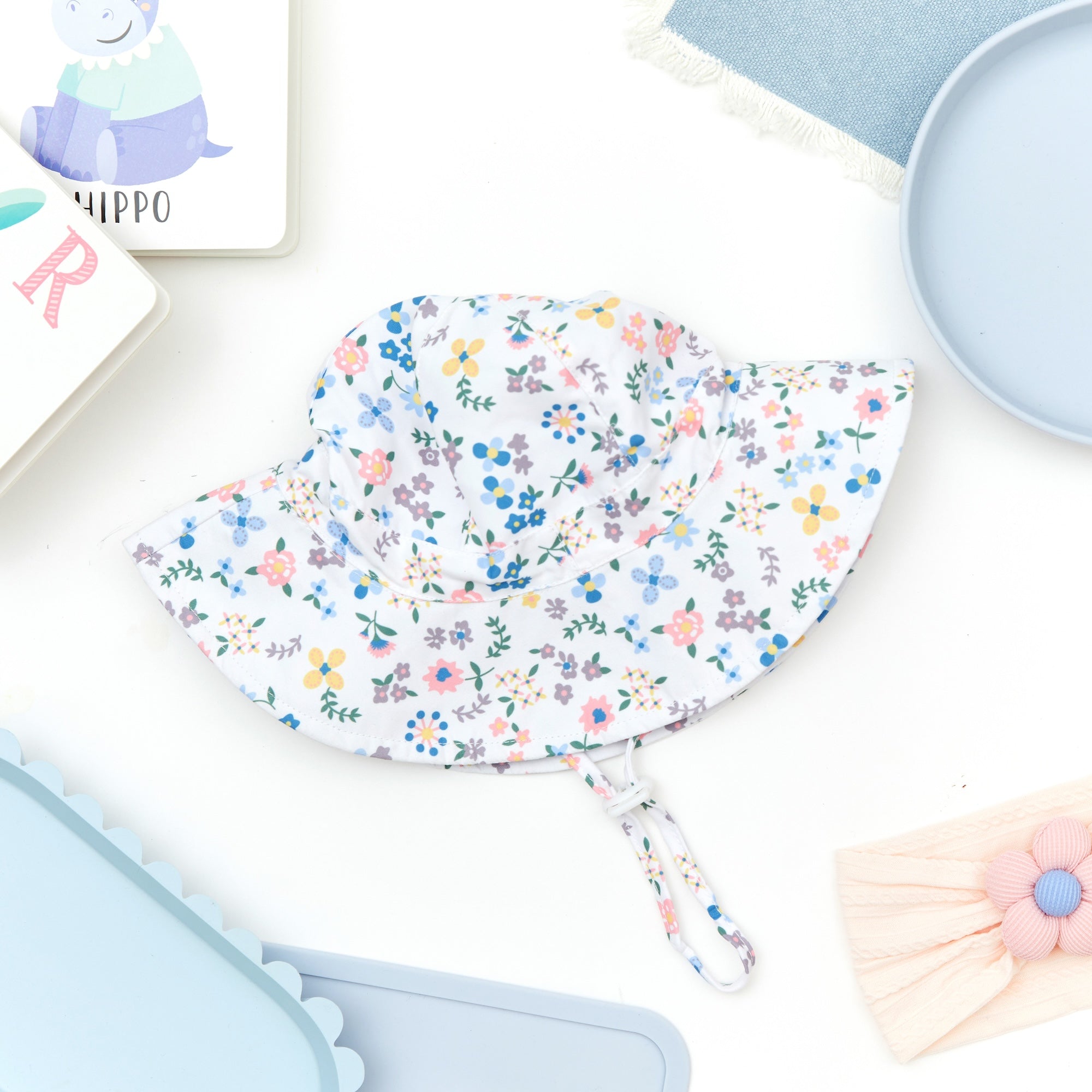 Wide Brim Baby Sun Hat in Petal Play — detail shot showing fabric texture and quality
