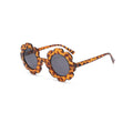 Ear detail baby sunglasses — Tortoise Shell Quinn Baby Sunglasses on white background