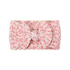 Cable knit floral baby headband with bow detail — Single Bow Cable Knit Baby Headband Floral Design #10 on white background