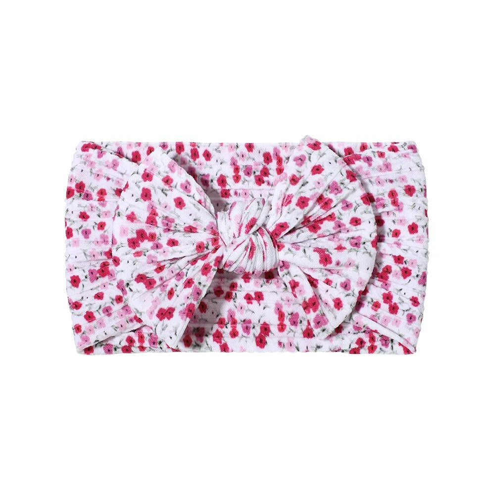 Cable knit floral baby headband with bow detail — Single Bow Cable Knit Baby Headband Floral Design #11 on white background