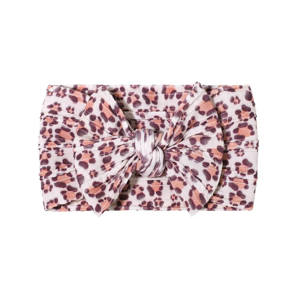 Cable knit floral baby headband with bow detail — Single Bow Cable Knit Baby Headband Floral Design #15 on white background