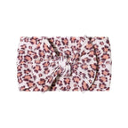 Cable knit floral baby headband with bow detail — Single Bow Cable Knit Baby Headband Floral Design #15 on white background