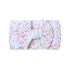 Cable knit floral baby headband with bow detail — Single Bow Cable Knit Baby Headband Floral Design #2 on white background