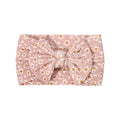 Cable knit floral baby headband with bow detail — Single Bow Cable Knit Baby Headband Floral Design #4 on white background