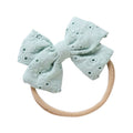 Teal cotton embroidered baby accessory — Little Embroidered Cotton Baby Bow on white background