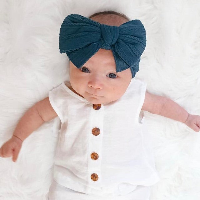 Bowie Double Bow Headband in Powder Blue — powder blue baby headband product styling