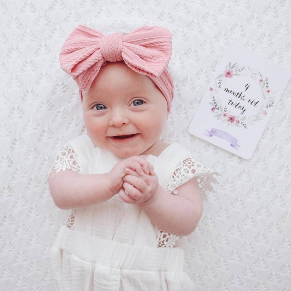 Baby girl wearing fairy floss pink baby headband with ear detail — Bowie Double Bow Headband