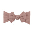 Blush pink nylon ear detail baby headband with bow detail — Bowie Single Bow Headband on white background