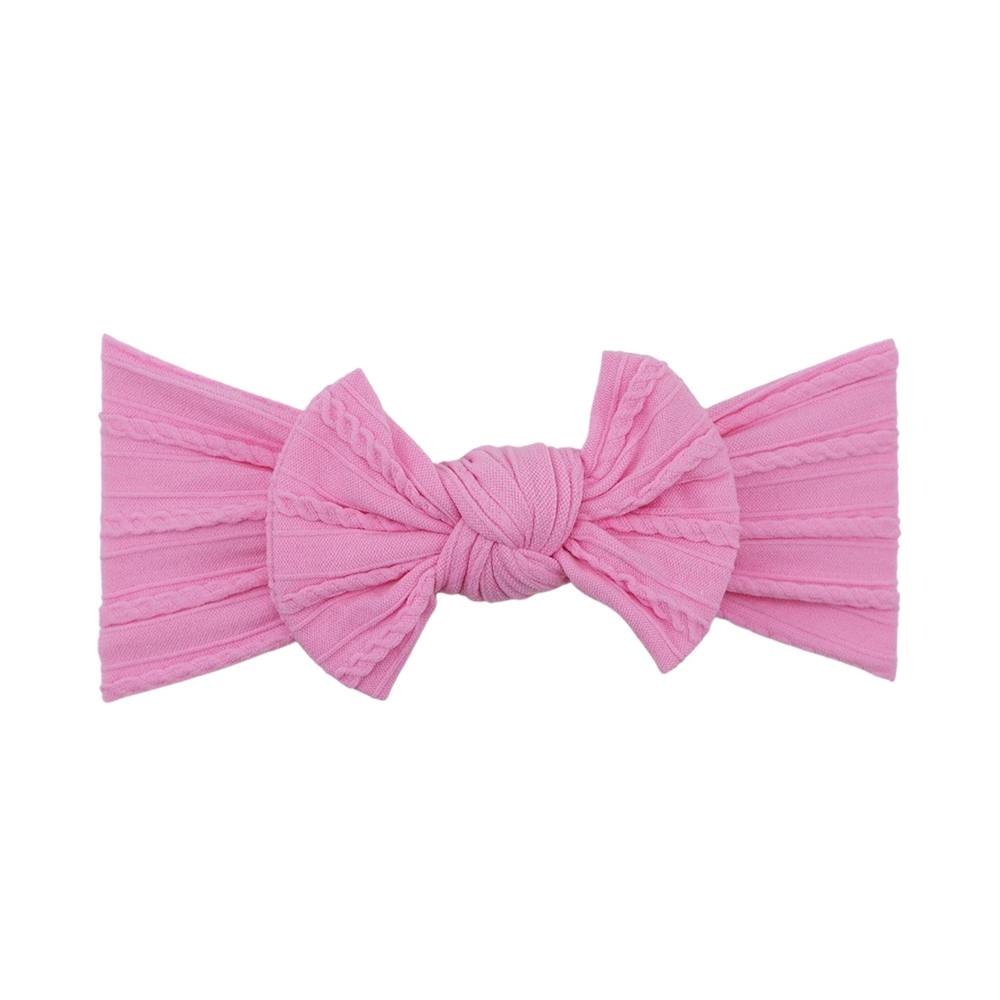 Fuchsia pink nylon ear detail baby headband with bow detail — Bowie Single Bow Headband on white background