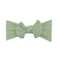 Laurel green nylon ear detail baby headband with bow detail — Bowie Single Bow Headband on white background