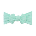 Mint green nylon ear detail baby headband with bow detail — Bowie Single Bow Headband on white background
