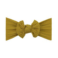 Mustard nylon ear detail baby headband with bow detail — Bowie Single Bow Headband on white background