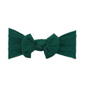 Pine green nylon ear detail baby headband with bow detail — Bowie Single Bow Headband on white background