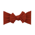 Rouge red nylon ear detail baby headband with bow detail — Bowie Single Bow Headband on white background