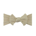 Sand nylon ear detail baby headband with bow detail — Bowie Single Bow Headband on white background