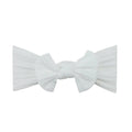 Bowie Bow Baby Headband in White, single bow, on white background