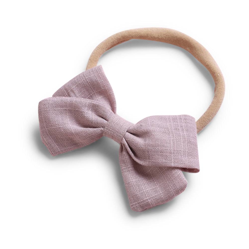 Crepe cotton baby hat — Tinka Tiny Bow on white background