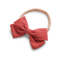 Rouge red cotton baby hat — Tinka Tiny Bow on white background