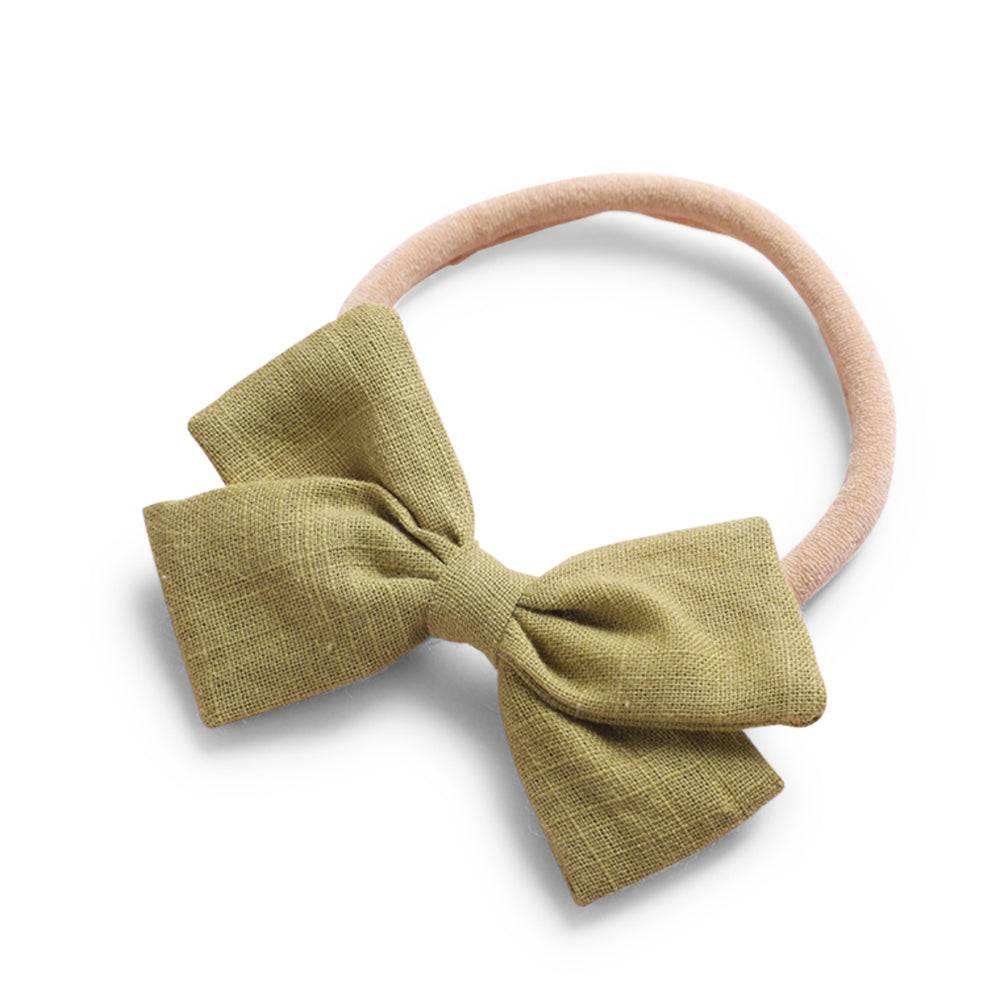 Sage green cotton baby hat — Tinka Tiny Bow on white background