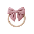 Blush knit textured baby headband with bow detail — Baby Small Waffle Bow Headband on white background