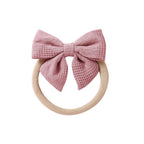 Blush knit textured baby headband with bow detail — Baby Small Waffle Bow Headband on white background