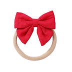 Strawberry knit textured baby headband with bow detail — Baby Small Waffle Bow Headband on white background