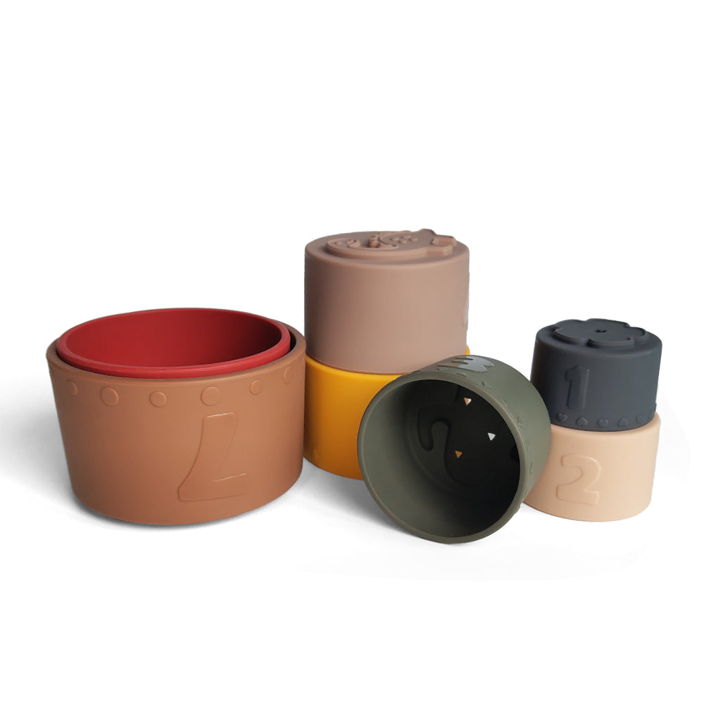 Silicone Baby Stacking Cups Bath & Beach in Earthy — baby hat size and scale reference