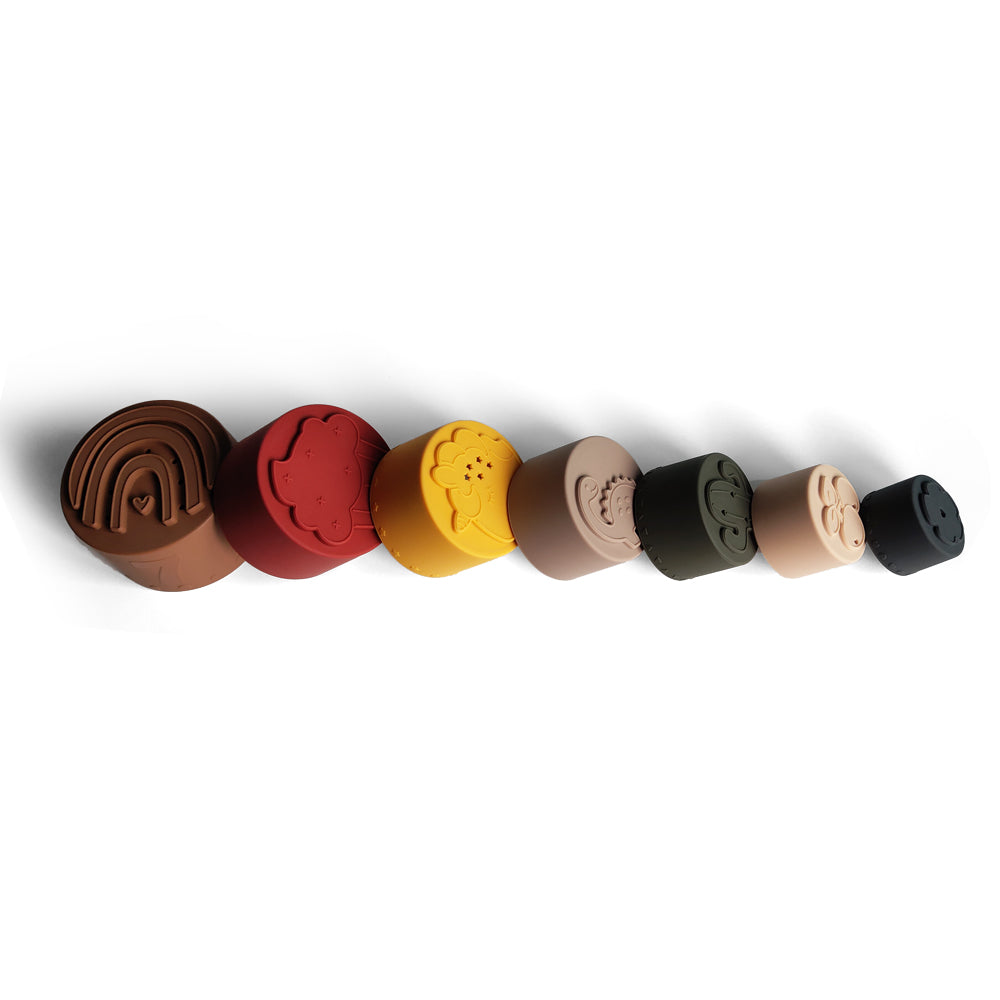 Silicone Baby Stacking Cups Bath & Beach in Earthy — baby hat size and scale reference