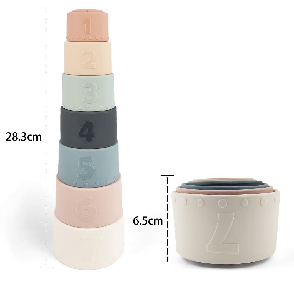 Silicone Baby Stacking Cups Bath & Beach in Pastel — baby hat size and scale reference