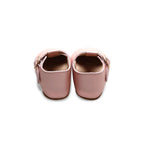Baby wearing baby shoes — Ballerina Pink Leather Baby T Bar Shoe