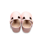 Ballerina Pink Leather Baby T Bar Shoe — baby shoes styled flat lay with nursery accessories