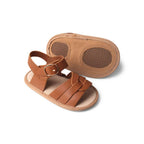 Baby feet in baby sandals on soft surface — Gingerbread Weave Leather Baby Sandal
