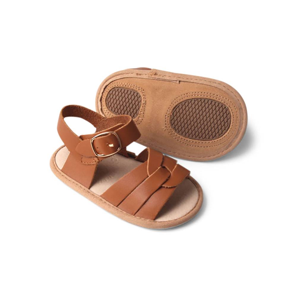 Baby feet in baby sandals on soft surface — Gingerbread Weave Leather Baby Sandal