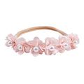 Lace floral baby headband — Delicate Baby Flower Crown with Pearls: Soft Shell Pink Flower Girl Headband on white background