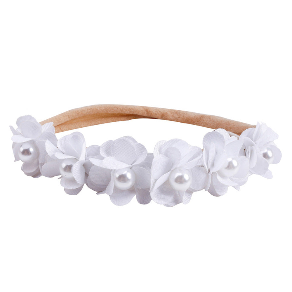 Lace floral baby headband — Delicate Baby Flower Crown with Pearls: White Petals Flower Girl Headband on white background