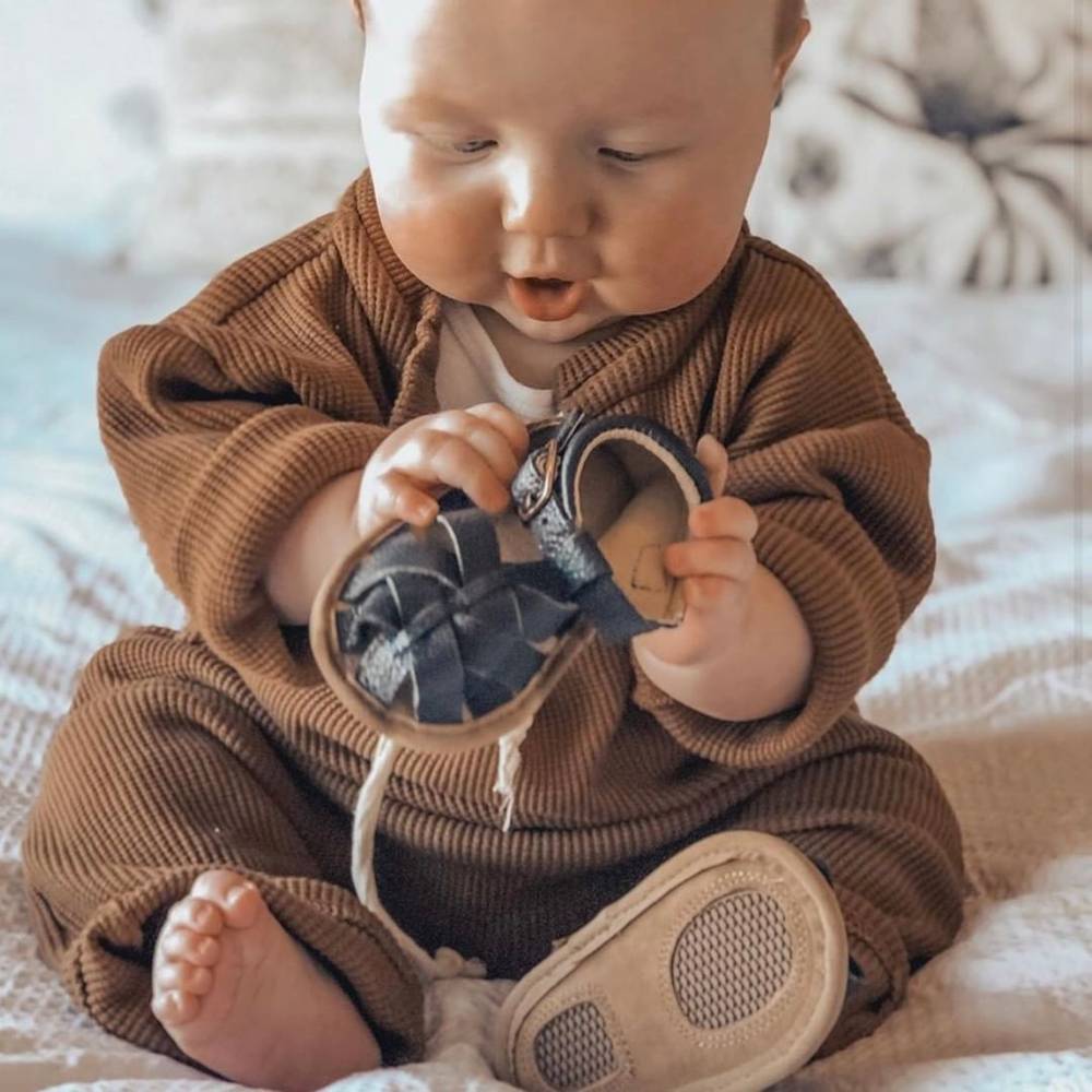 Zodiac Blue Leather Baby Sandal — baby sandals styled flat lay with nursery accessories