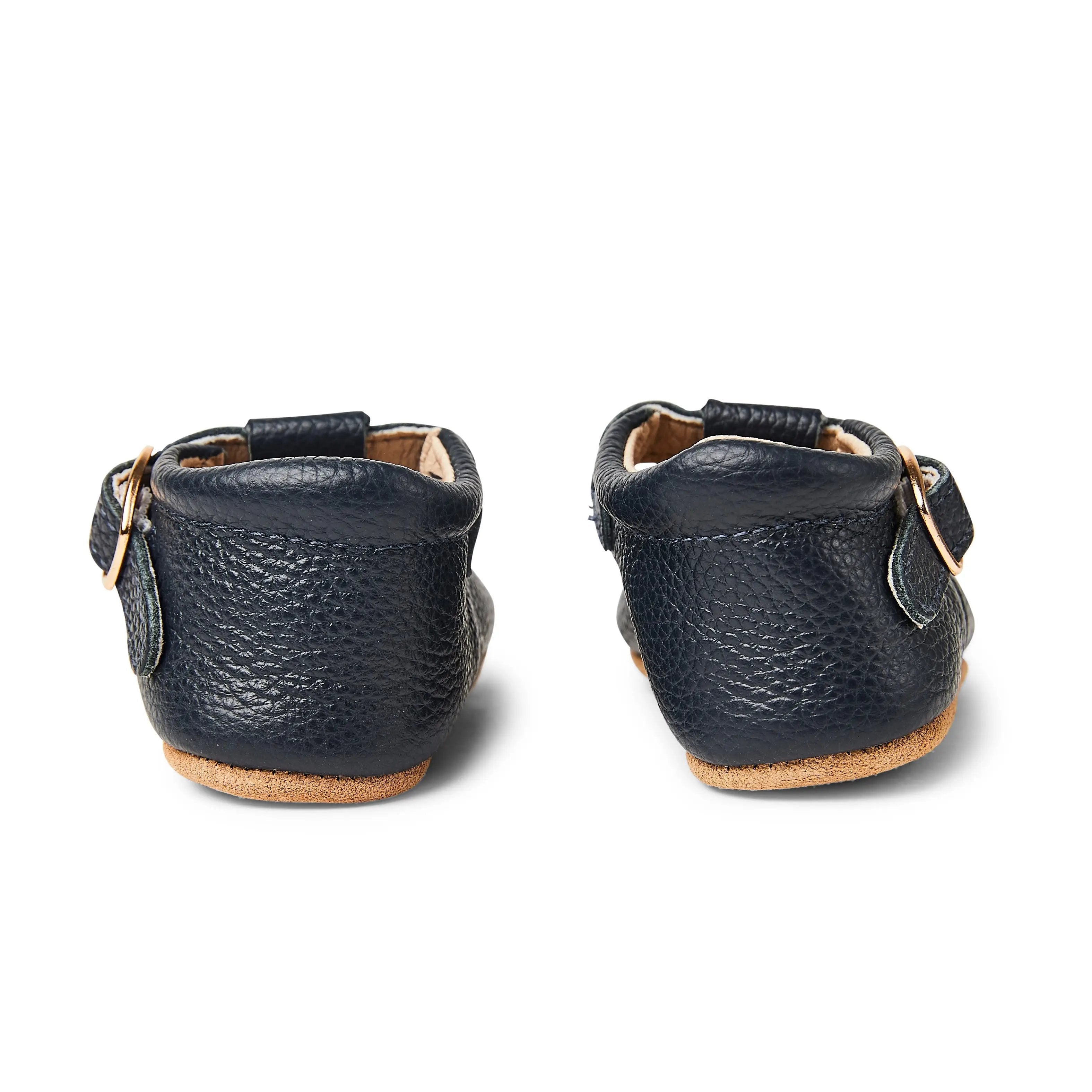 Nile Blue Leather Baby T Bar Shoe — close-up showing lace texture and craftsmanship