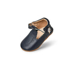 Nile Blue Leather Baby T Bar Shoe — baby shoes styled flat lay with nursery accessories