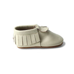 Lace fringe baby shoes — Oatmeal Cookie Baby Fringed Moccasin Shoe on white background