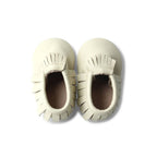Baby wearing baby shoes — Oatmeal Cookie Baby Fringed Moccasin Shoe
