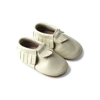 Oatmeal Cookie Baby Fringed Moccasin Shoe — close-up of fringe on baby shoes