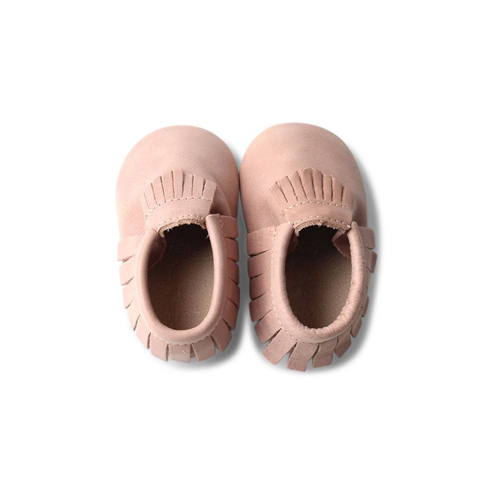 Baby wearing baby shoes — Piglet Baby Fringed Moccasin Shoe