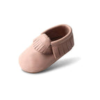 Baby wearing baby shoes — Piglet Baby Fringed Moccasin Shoe
