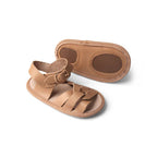 Baby feet in baby sandals on soft surface — Tawny Weave Leather Baby Sandal