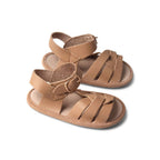 Baby feet in baby sandals on soft surface — Tawny Weave Leather Baby Sandal