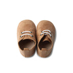 Baby feet in baby booties — Teddy Baby Lace Up Oxford Bootie