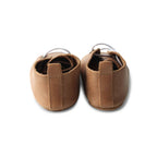 Teddy Baby Lace Up Oxford Bootie — baby booties styled flat lay with nursery accessories